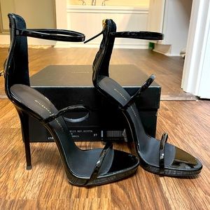 Never worn. New with box & dust bag.